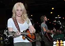Cheyenne Kimball performing aboard the USS&nbsp;Abraham Lincoln&nbsp;(CVN-72) in 2010