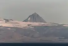 Pogramni (6,569&nbsp;ft; 2,002&nbsp;m) volcano as seen from the Unimak Pass in the morning light.