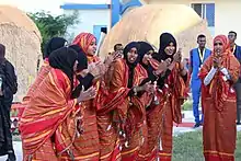 Image 57Somali women performing tradition dance (from Culture of Somalia)