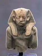 Upper part of portrait statuette of pharaoh Amenemhat III, wearing a nemes, c. 1853&nbsp;– c. 1805&nbsp;BC