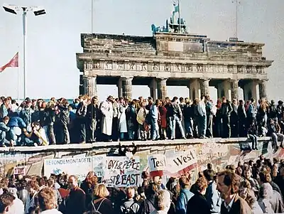 People standing on a wall (from Human history)