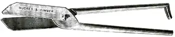 Cross-hatched drawing of a pair of shears.
