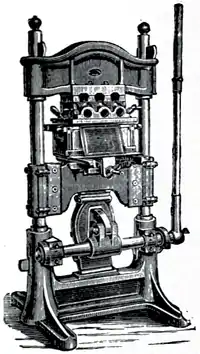 Cross-hatched illustration of a blocking machine.
