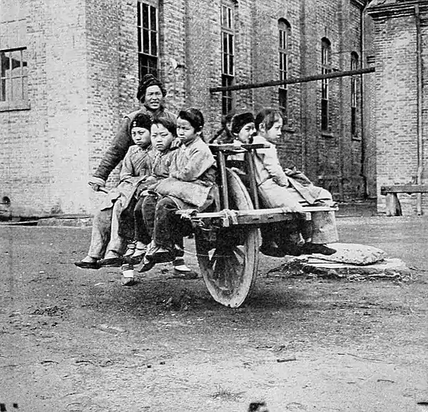 Farmers of forty centuries - A common means of transport on the streets of Shanghai.jpg