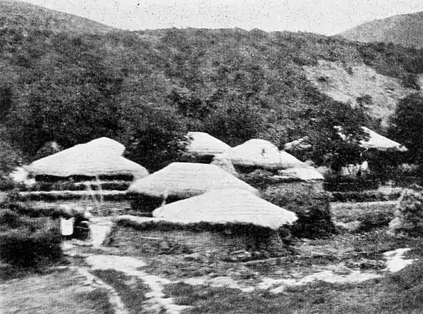 Farmers of forty centuries - Korean farm houses with thatched roofs and earthern walls.jpg