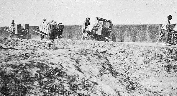 Farmers of forty centuries - Men freighters going inland with loads of matches.jpg