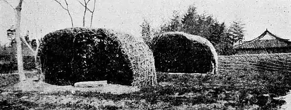 Farmers of forty centuries - Two dye pits under woven arbor shelter.jpg