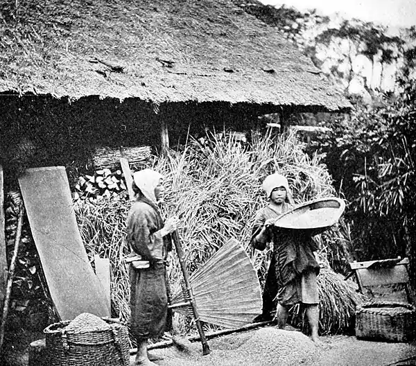 Farmers of forty centuries - Winnowing rice in Japan.jpg