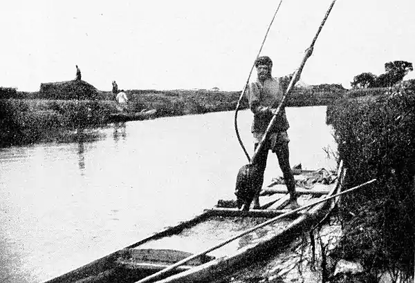 Farmers of forty centuries - loading a boat with canal mud.jpg