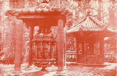 BRONZE LANTERN FROM KOREA AND CANDELABRUM FROM HOLLAND.