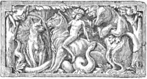 Wood carving of Mowgli riding Bagheera