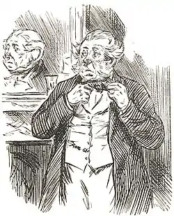 Mr. Caudle finds a button off his shirt.jpg